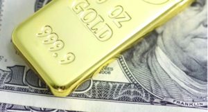 Fragilidad de la Fed impulsa caminos opuestos para el dólar y el oro